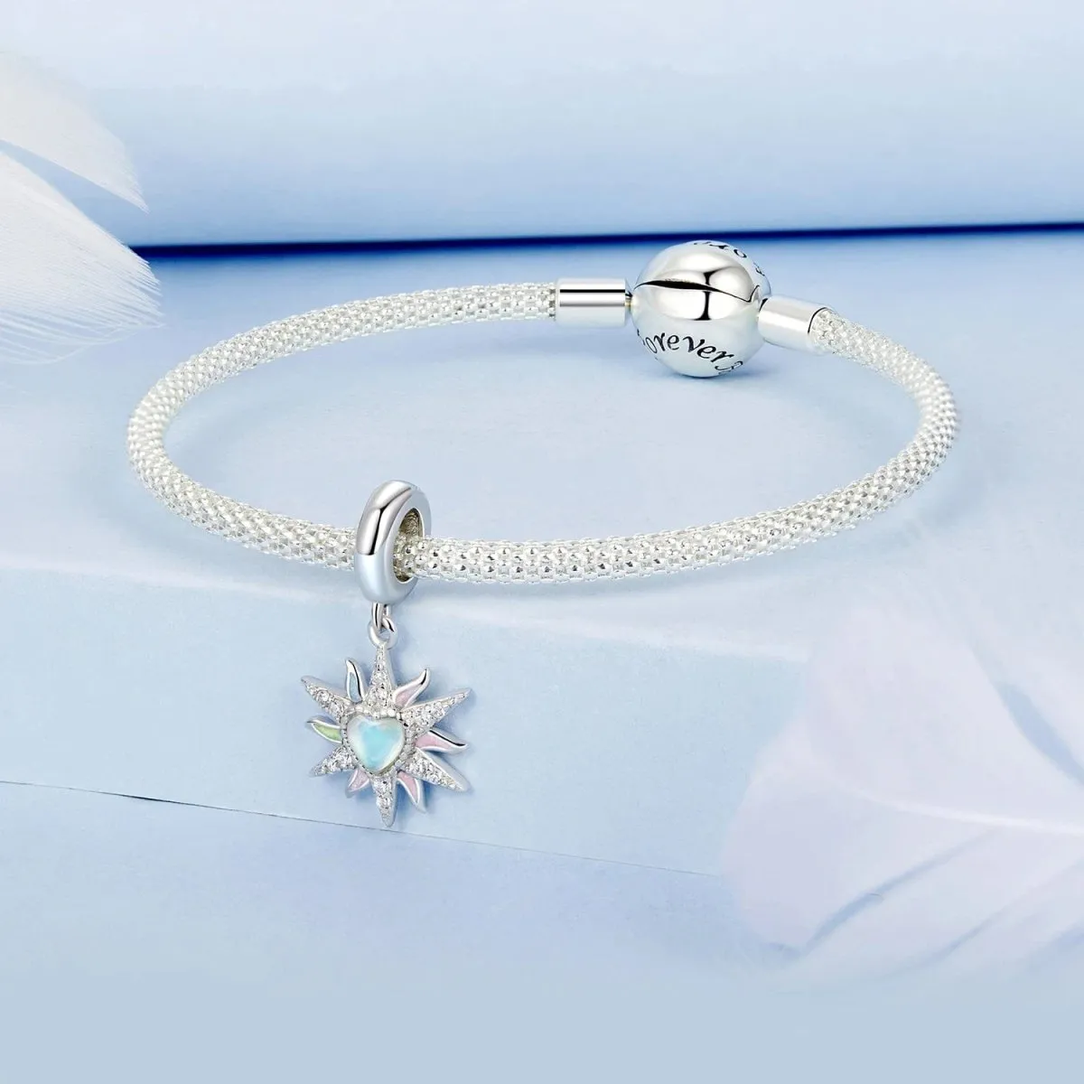 Radiant Sunburst with Opal Heart and Pastel Accents Dangle Charm