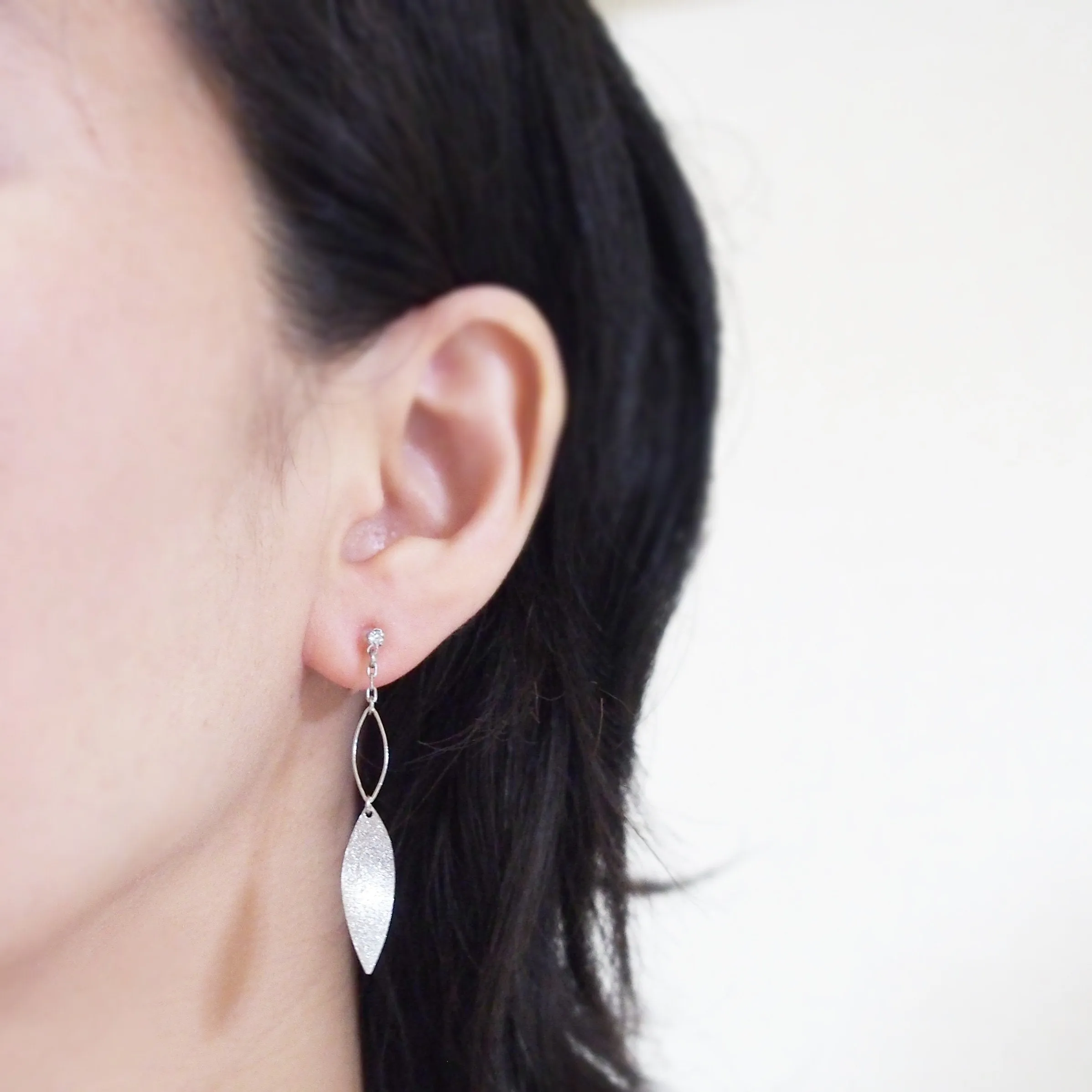 Silver textured metallic leaf invisible clip on earrings